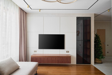 A Modern Living Room Interior Featuring a TV and a Contemporary Design Style and Aesthetic