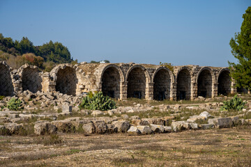 Rows of columns in Perge, Antalya, Turkey. Remains of colonnaded street in Pamphylian ancient city.Rows of columns in Perge, Antalya, Turkey. Ancient Kestros Fountain. Aksu, Antalya