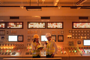 The world relies on the expertise of Asian male and female engineers to innovate sustainable energy solutions for power plants and transform the future of the energy industry.