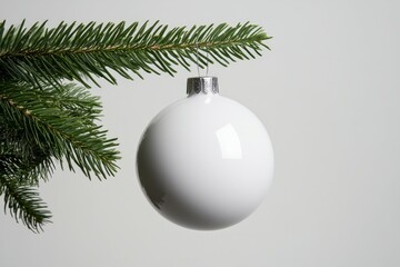 A round white Christmas tree ornament