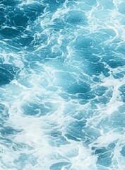 Fototapeta premium Calm ocean surface with gently lapping waves in shades of blue and white, creating a serene and dynamic background for underwater scenes.