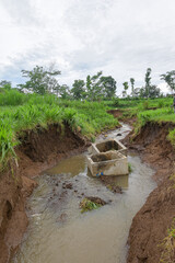 Stream erosion of flows due to flooding. Fragile soil. Natural disasters