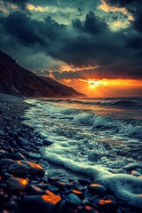 Fototapeta premium A serene sunset over a rocky beach, with waves gently lapping at the stones under a dramatic sky.