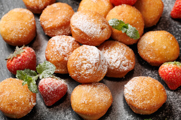 Mini Strawberry Doughnuts on stone board