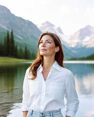 Elegant older confident woman at a serene lake, showcasing health, wellness, and maturity in outdoor beauty, aging gracefully during active healthy lifestyle retirement