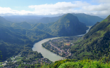 View from the top viewpoint of nong khiaw in laos. Muang Ngoi village, beautiful of countryside in northern Laos.	
