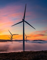 Wind turbines silhouetted against a vibrant sunset sky, generating sustainable energy