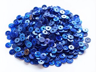 Pile of Dark Blue Sequins Isolated on White Background for Urban Exploration and Creative Projects, Perfect for Fashion, Crafts, or Artistic Designs in Stock Photography