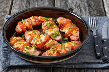 hot sausages baked with cheese, tomato, mustard