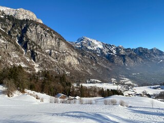 Winter atmosphere in spacious subalpine valley Seeztal along the Seez River between Lake Walensee and the Rheintal Valley, Walenstadtberg - Canton of St. Gallen, Switzerland (Schweiz)