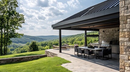 Modern stone patio with outdoor dining area and stunning valley view.