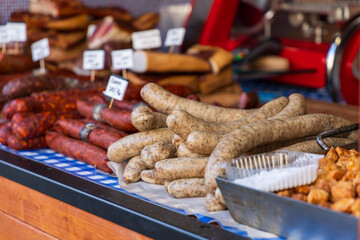 Meat sausages and hot dogs on the counter at the markets