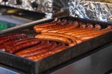Meat sausages and hot dogs on the counter at the markets