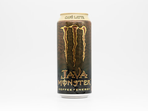 DRESDEN, GERMANY - 29. November 2024: Monster Java Caf&eacute; Latte beverage. The energy drink is a blend with creamy coffee brew. The can design is a textured dark brown with a golden claw.