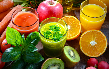 Glasses with fresh organic vegetable and fruit juices