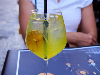limoncello with ice and lemon slices