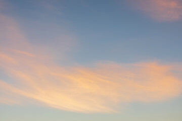 A sky with beautiful, soft pink clouds.