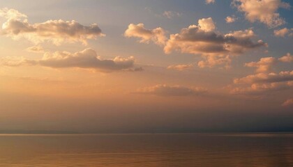 Obraz premium hazy sunset with dramatic clouds
