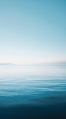 Obraz premium Tranquil ocean scene blue and white gradient coastal serenity in nature photography