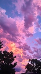 Obraz premium Calm tranquility aerial view of soft pastel clouds at sunset in pink and purple