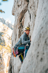 Fototapeta premium climber on a rock, multi pitch, climbing, croatia, paklenica, national park, alpinism, drone, air2s, dji