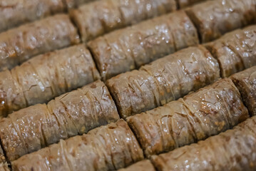 Baclava layered pastry dessert made of filo pastry, filled with chopped nuts, and sweetened with syrup or honey. Baclava or pakhlava the sweet pastries of Ottoman, Arabian, Persian and Greek cuisine