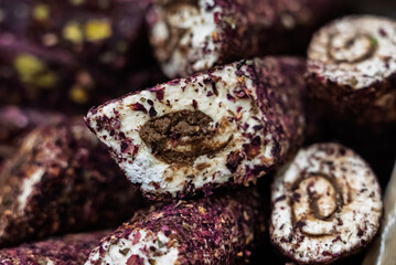 Turkish delight or lokum, halgoum is a family of confections with starch and sugar. Premium turkish delight. Famous turkish and greek sweet dessert. Turkish delight close up shot of colorful sweets.