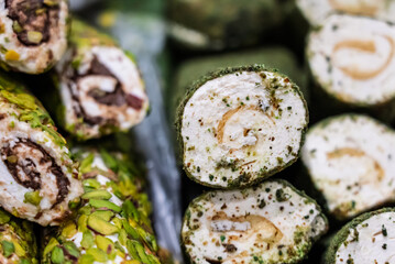 Turkish delight or lokum, halgoum is a family of confections with starch and sugar. Premium turkish delight. Famous turkish and greek sweet dessert. Turkish delight close up shot of colorful sweets.