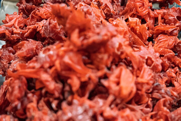 Dried colorful tropical fruits. Sweet fruits in dried form. Close up shot of dried sweet tropical fruits.