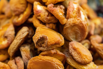 Dried colorful tropical fruits. Sweet fruits in dried form. Close up shot of dried sweet tropical fruits.
