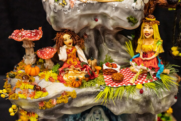 Fototapeta premium Artistic colorful handmade chocolate cakes. Cakes with a lot of artistic details. Characters on cakes. Realistic handmade cake.