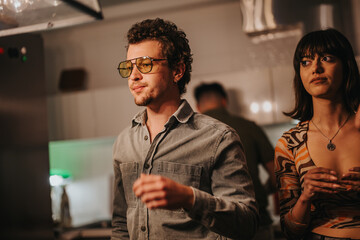 Friends gathering in cozy kitchen for birthday celebration