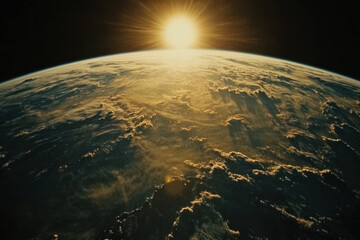 A breathtaking view of Earth with the sun rising above the horizon.