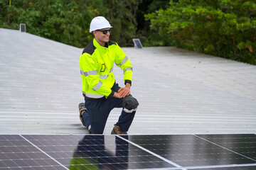 Men technicians mounting photovoltaic solar modules on roof of house. Renewable Energy Eco Technolog