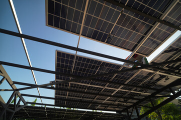 Renewable Energy Eco Technology Electric Power. Worker assemble energy system with solar panel for electricity.(Multiple values)