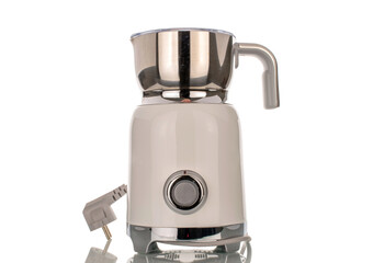 One milk frother, close-up, isolated on white background.