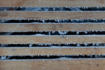 Icy Boundaries: The Frosted Beauty of a Wood Fence. Frozen in Time: A Wood Fence Captured in Winter's Embrace.