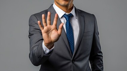 a_male_hand_in_a_suit_shows_a_palmup_gesture 