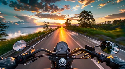 Scenic Motorcycle Ride at Sunset Along Serene Road Beside Water with Dramatic Cloudscape and Vibrant Colors in the Sky