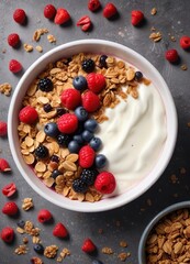 overhead view of a large bowl filled with creamy yogurt topped with crunchy granola and an assortment of fresh berries, breakfast cereal, brown ceramic