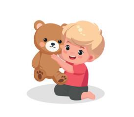 baby boy playing with teddy bear 