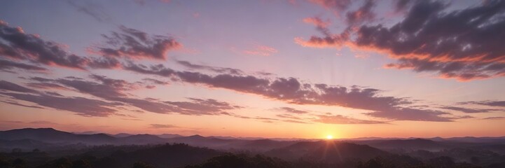 Fototapeta premium The sky is painted with soft pastels as the sun dips below the horizon , warm light, peaceful evening