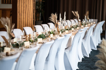 Wedding decor. Beautiful event venue. Indoor round reception table