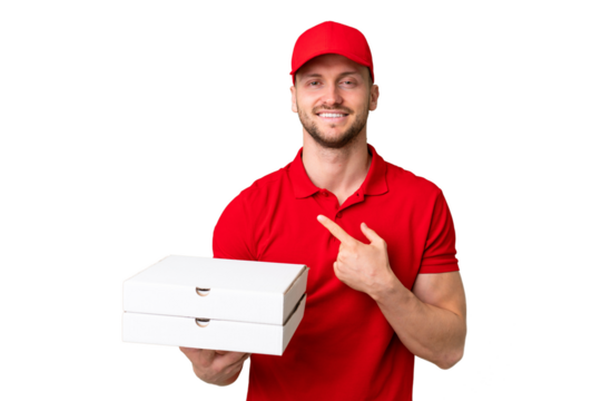 Pizza delivery man with work uniform picking up pizza boxes over isolated chroma key background pointing to the side to present a product