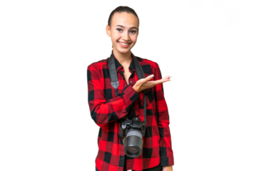 Young photographer Arab woman over isolated background presenting an idea while looking smiling towards