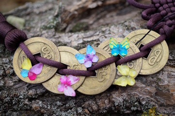 Chinese feng shui coins and toy little butterflies. Decoration and decor.