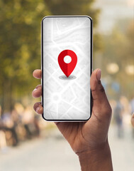 Smartphone With Opened Gps App With Red Pinpoint On Screen In Black Female Hand, Unrecognizable...