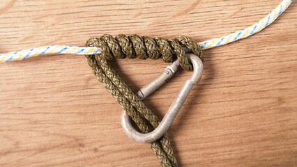 Carabiner and Rope. Grasping Oblique. Austrian Klemheist Knot. Climbing and Nautical Applications.