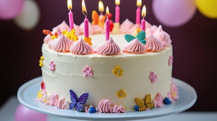 Colorful birthday cake adorned with candles and decorations ready for celebration at a festive gathering