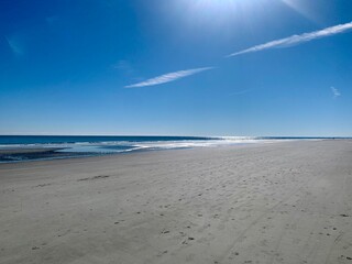 beach and sea in the morning sandy sunny beach landscape warm summer perfect day ocean picturesque sky and clouds tropical island sunny beach